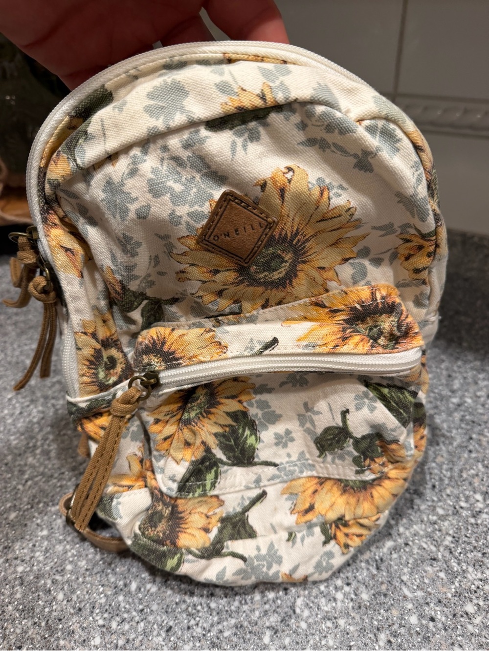 O'Neill Sunflower Print Mini Backpack in Cream and Yellow